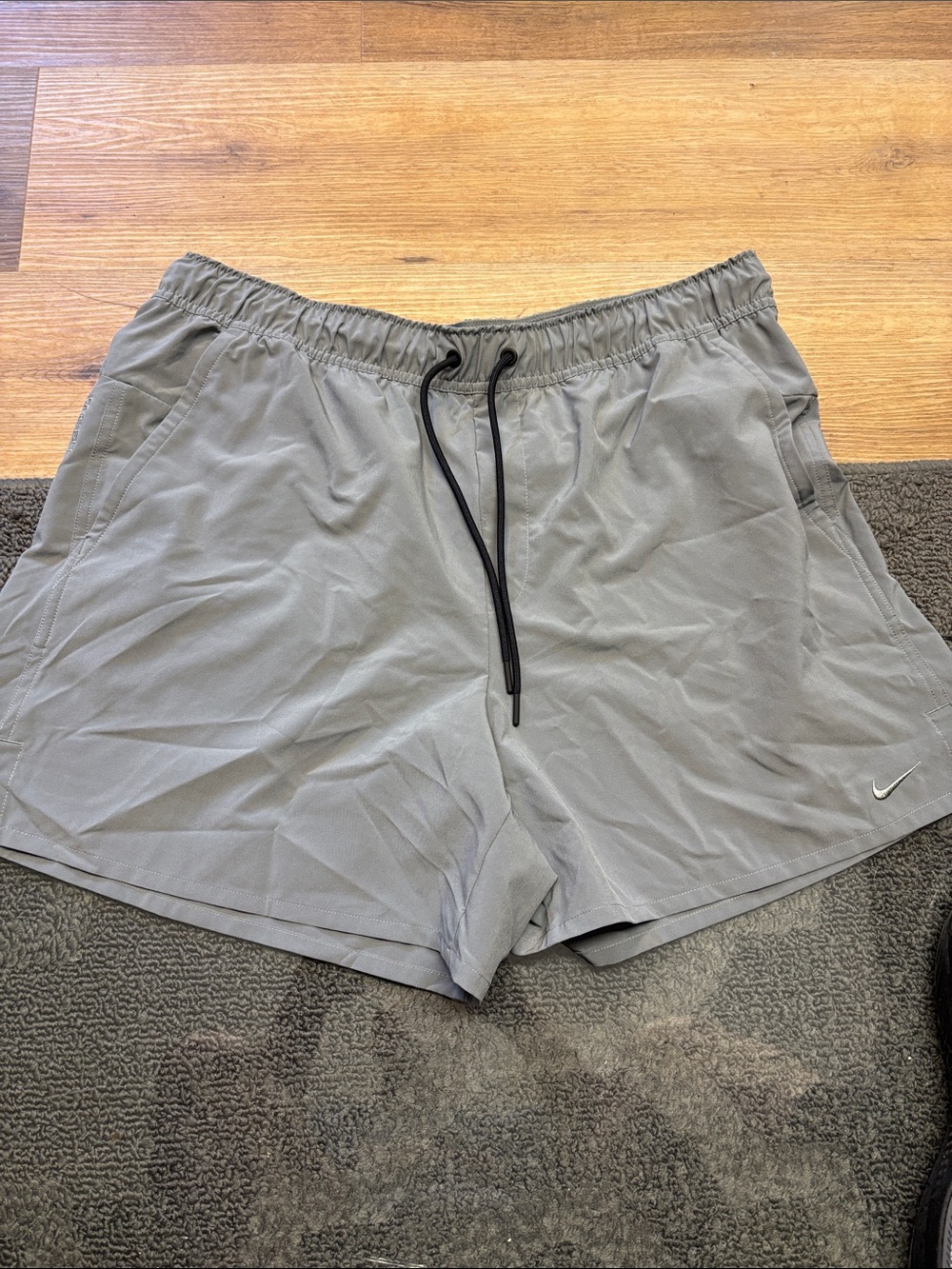 Nike Men's Light Gray Athletic Shorts with Black Drawstring Back Pocket